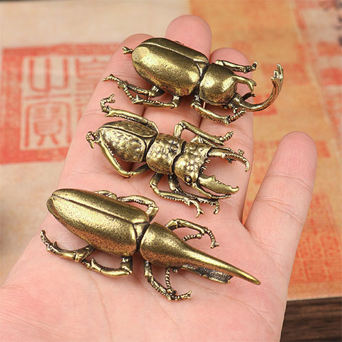 brass insect ornament